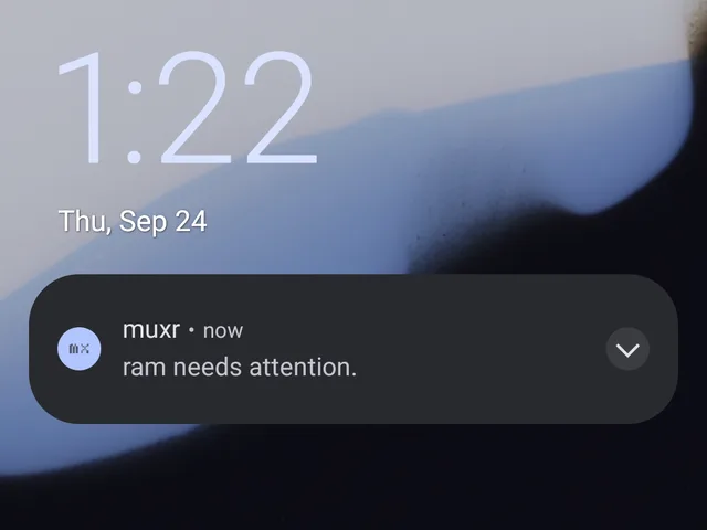 A phone’s lock screen with a muxr notification: ram needs attention